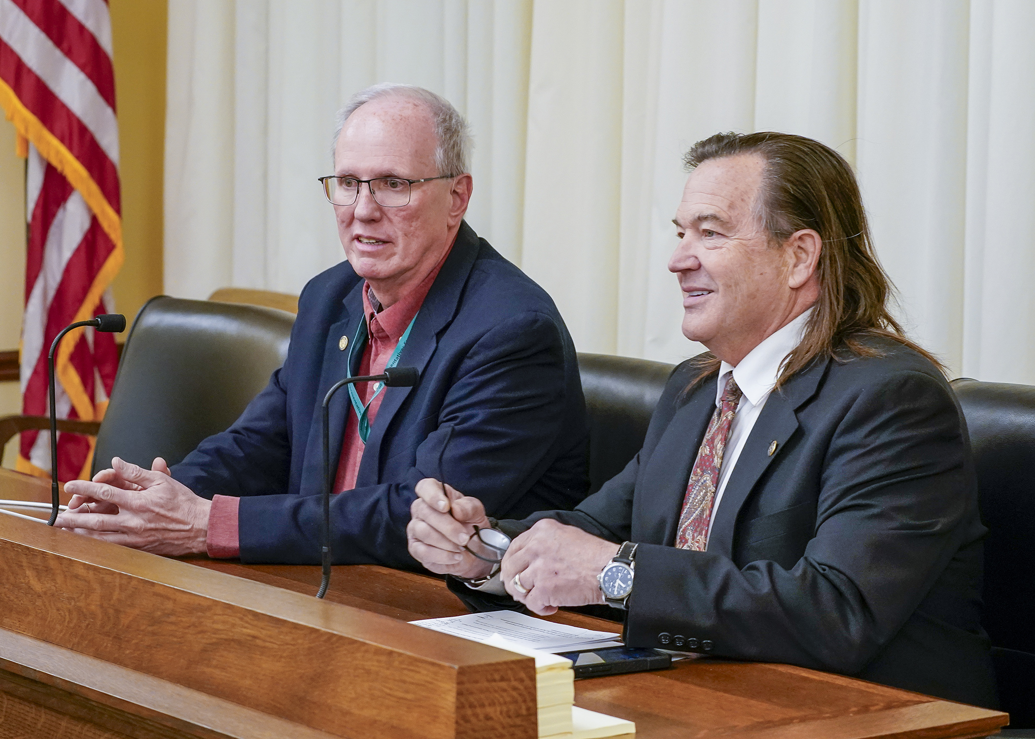 Rep. Leon Lillie, right, and Rep. Tim O’Driscoll present the omnibus pensions and retirement bill to the House Ways and Means Committee May 7. (Photo by Andrew VonBank)